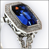 Sapphire and diamonds in platinum mounting